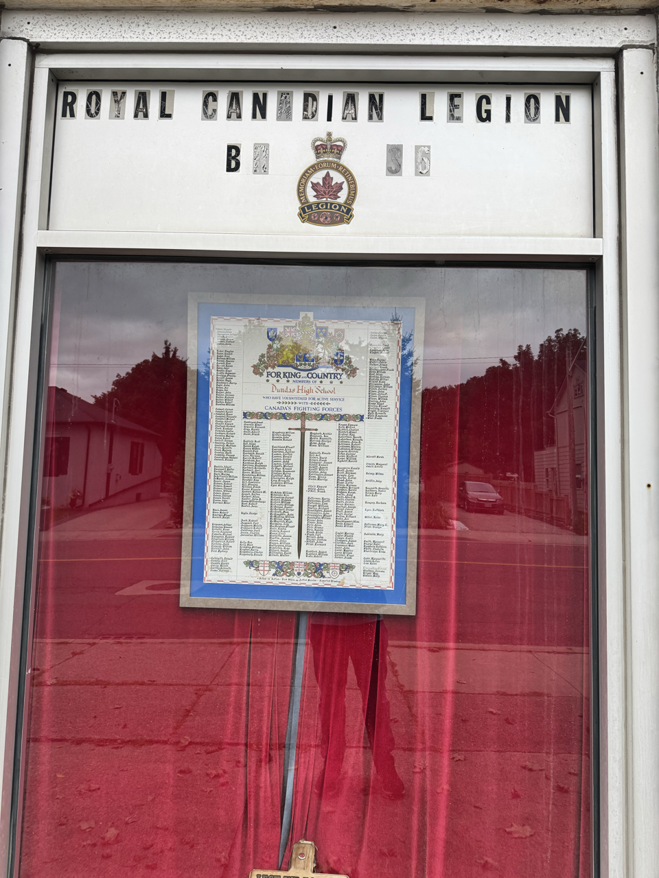 Entrance of Royal Canadian Legion Branch 36 with the For King and Country display window